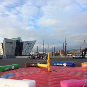 leg sweeper hire - inflatable games at Titanic Slipways in Belfast